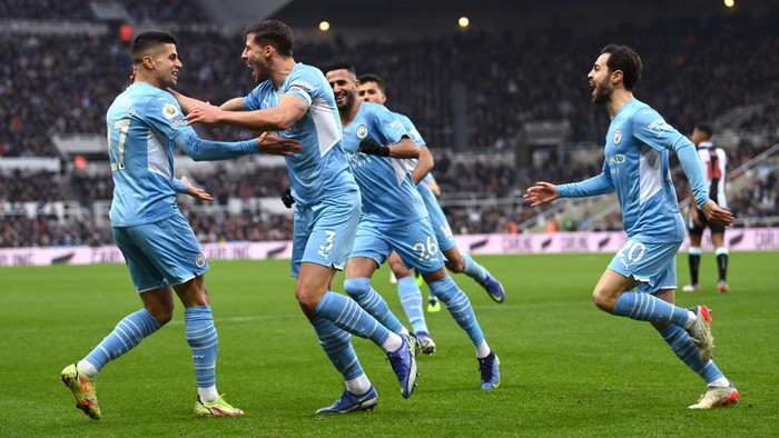 NEWCASTLE UPON TYNE, ENGLAND - DECEMBER 19: Manchester City player Ruben Dias (#3) celebrates after scoring the first City goal during the Premier League match between Newcastle United  and  Manchester City at St. James Park on December 19, 2021 in Newcastle upon Tyne, England. (Photo by Stu Forster/Getty Images)