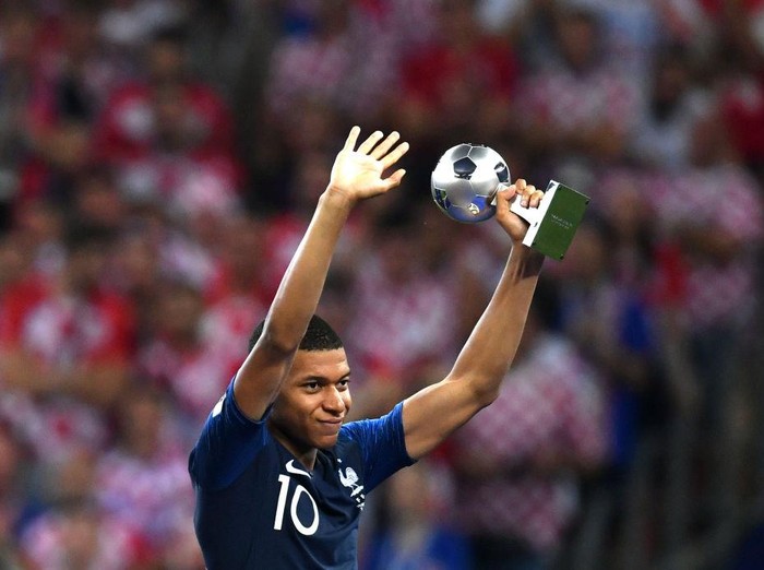 MOSCOW, RUSSIA - JULY 15:  Kylian Mbappe of France celebrates after scoring during the 2018 FIFA World Cup Russia Final between France and Croatia at Luzhniki Stadium on July 15, 2018 in Moscow, Russia.  (Photo by Shaun Botterill/Getty Images)