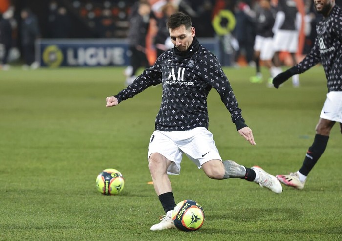 Lionel Messi PSG's Lionel Messi warms up before the French League One soccer match between FC Lorient and Paris Saint-Germain at the Moustoir stadium in Lorient, western France, Wednesday, Dec. 22, 2021. (AP Photo/Jeremias Gonzalez)