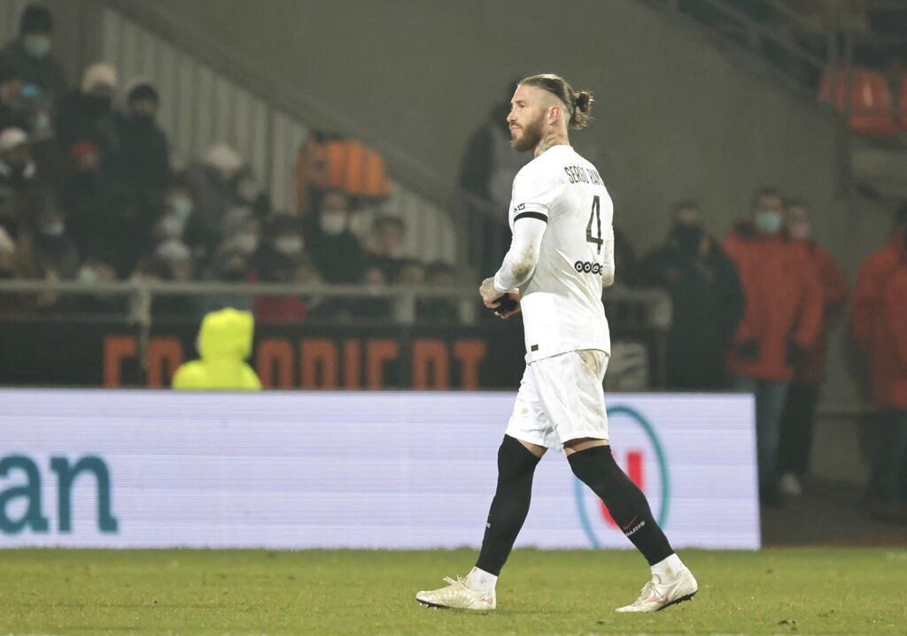 PSG's Sergio Ramos walk off the pitch after he received red card during the French League One soccer match between FC Lorient and Paris Saint-Germain at the Moustoir stadium in Lorient, western France, Wednesday, Dec. 22, 2021. (AP Photo/Jeremias Gonzalez)