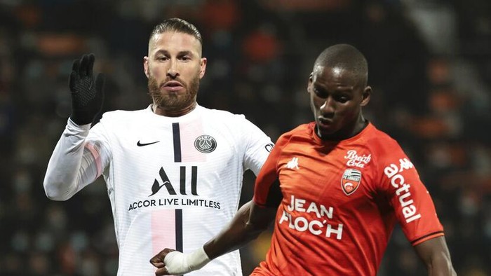 Sergio Ramos Lorient's Houboulang Mendes, right, and PSG's Sergio Ramos challenge for the ball during the French League One soccer match between FC Lorient and Paris Saint-Germain at the Moustoir stadium in Lorient, western France, Wednesday, Dec. 22, 2021. (AP Photo/Jeremias Gonzalez)