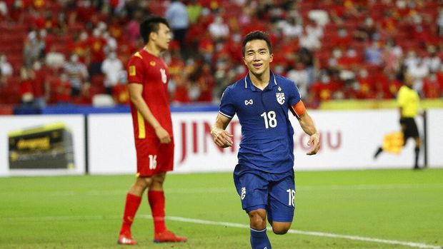 Chanathip Songkrasin of Thailand celebrates after scoring the second goal during the AFF Suzuki Cup 2020 semi-final first leg match between Vietnam and Thailand in Singapore, Thursday, Dec. 23, 2021. (AP Photo/Suhaimi Abdullah)