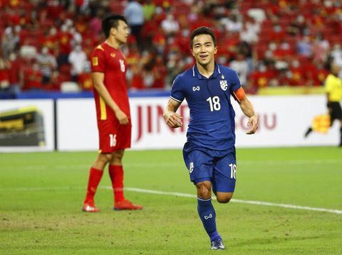 Chanathip Songkrasin of Thailand celebrates after scoring the second goal during the AFF Suzuki Cup 2020 semi-final first leg match between Vietnam and Thailand in Singapore, Thursday, Dec. 23, 2021. (AP Photo/Suhaimi Abdullah)