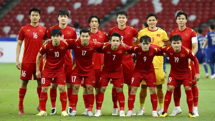 Vietnam players pose for a photo prior to the AFF Suzuki Cup 2020 semi-final first leg match between Vietnam and Thailand in Singapore, Thursday, Dec. 23, 2021. (AP Photo/Suhaimi Abdullah)