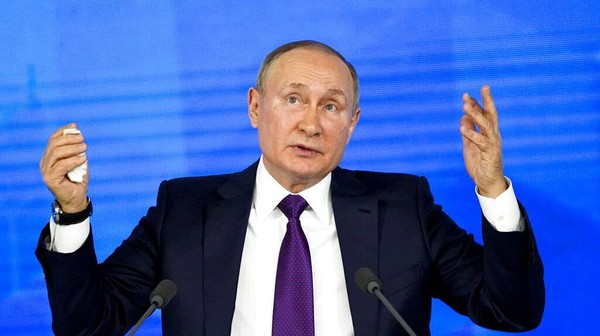 Russian President Vladimir Putin gestures during his annual news conference in Moscow, Russia, Thursday, Dec. 23, 2021. Putin has urged the West to immediately meet Russias demand for security guarantees precluding NATOs expansion to Ukraine and the deployment of the military alliances weapons there. (AP Photo/Alexander Zemlianichenko)