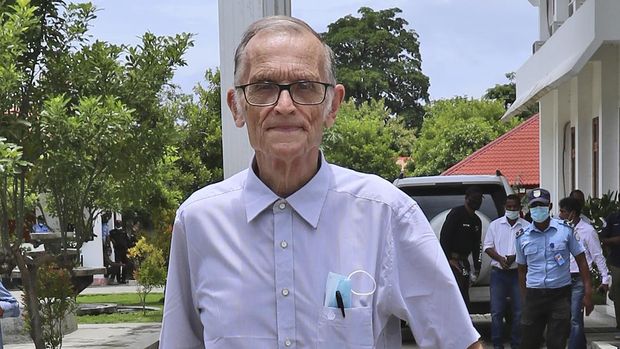 Richard Daschbach FILE - Richard Daschbach, a former missionary from Pennsylvania, is escorted by a police officer upon his arrival for a trial at a courthouse in Oecusse, East Timor on Feb. 23, 2021. The defrocked American priest accused of sexually abusing orphaned and disadvantaged young girls under his care in East Timor was found guilty Tuesday, Dec. 21, 2021 and sentenced to 12 years in prison, in the first case of its kind in the staunchly Catholic nation. (AP Photo/Raimundos Oki, File)