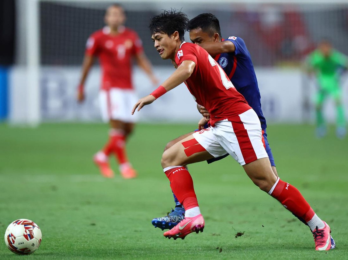 Babak pertama Indonesia vs Singapura di semifinal leg kedua Piala AFF 2020 berakhir 1-1. (Foto: Yong Teck Lim/Getty Images)