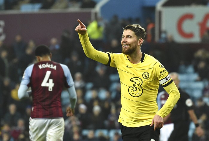 Chelseas Jorginho celebrates after scoring his sides third goal during the English Premier League soccer match between Aston Villa and Chelsea at Villa Park in Birmingham, England, Sunday, Dec. 26, 2021. (AP Photo/Rui Vieira)