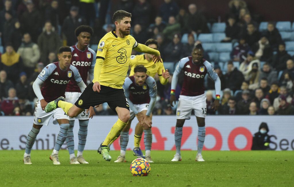 Chelsea's Jorginho celebrates after scoring his side's third goal during the English Premier League soccer match between Aston Villa and Chelsea at Villa Park in Birmingham, England, Sunday, Dec. 26, 2021. (AP Photo/Rui Vieira)