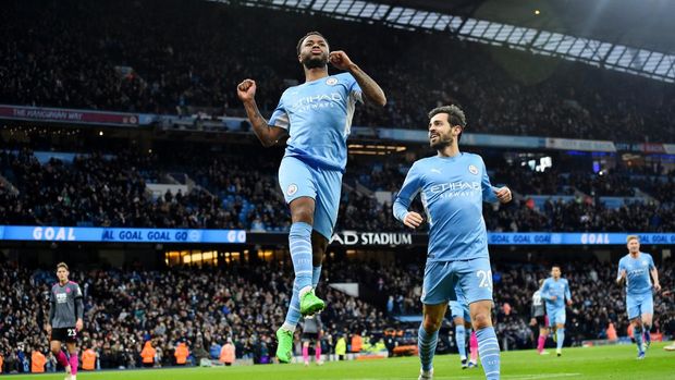 Soccer Football - Premier League - Manchester City v Leicester City - Etihad Stadium, Manchester, Britain - December 26, 2021 Manchester City's Raheem Sterling celebrates scoring their fourth goal Action Images via Reuters/Peter Powell EDITORIAL USE ONLY. No use with unauthorized audio, video, data, fixture lists, club/league logos or 'live' services. Online in-match use limited to 75 images, no video emulation. No use in betting, games or single club /league/player publications.  Please contact your account representative for further details.