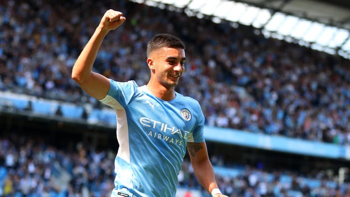 MANCHESTER, ENGLAND - AUGUST 28: Ferran Torres of Manchester City celebrates after scoring their sides second goal  during the Premier League match between Manchester City and Arsenal at Etihad Stadium on August 28, 2021 in Manchester, England. (Photo by Catherine Ivill/Getty Images)