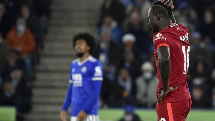 Liverpools Sadio Mane reacts after missing a chance to score during the English Premier League soccer match between Leicester City and Liverpool at the King Power Stadium in Leicester, England, Tuesday, Dec. 28, 2021. (AP Photo/Rui Vieira)