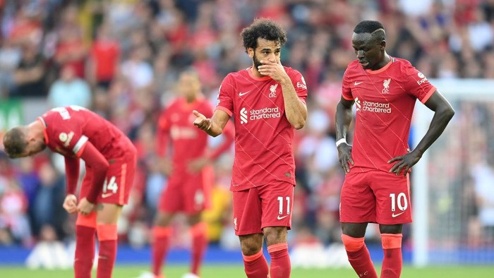 LIVERPOOL, ENGLAND - AUGUST 28: Mohamed Salah and Sadio Mane of Liverpool interact  during the Premier League match between Liverpool  and  Chelsea at Anfield on August 28, 2021 in Liverpool, England. (Photo by Michael Regan/Getty Images)