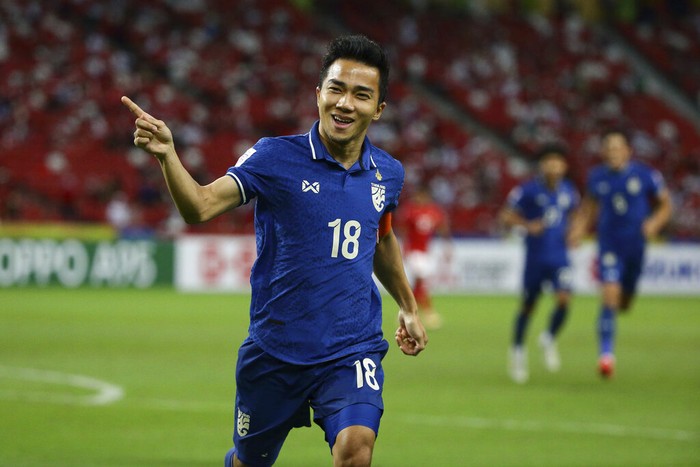 Chanathip Songkrasin of Thailand celebrates after scoring the first goal during the AFF Suzuki Cup 2020 final first leg soccer match between Indonesia and Thailand in Singapore, Wednesday, Dec. 29, 2021. (AP Photo/Suhaimi Abdullah)