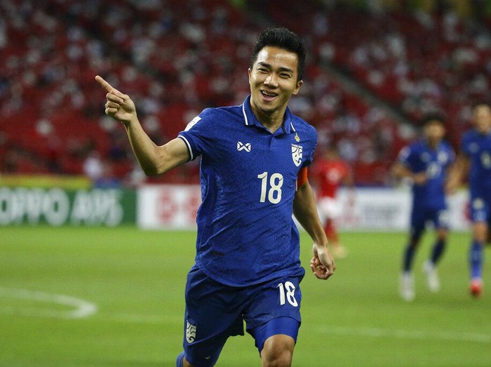 Chanathip Songkrasin of Thailand celebrates after scoring the first goal during the AFF Suzuki Cup 2020 final first leg soccer match between Indonesia and Thailand in Singapore, Wednesday, Dec. 29, 2021. (AP Photo/Suhaimi Abdullah)