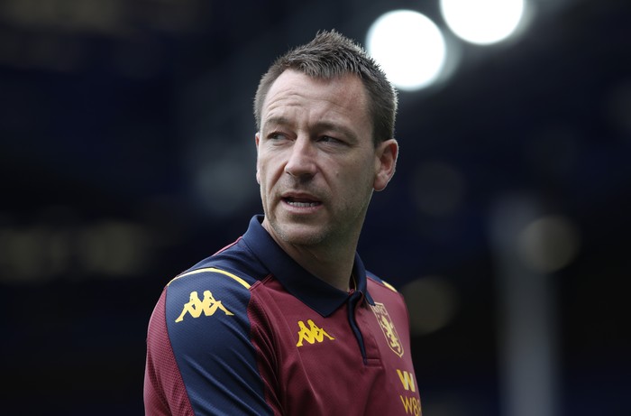 LIVERPOOL, ENGLAND - JULY 16: John Terry, Assistant Manager of Aston Villa looks on prior to the Premier League match between Everton FC and Aston Villa at Goodison Park on July 16, 2020 in Liverpool, England. Football Stadiums around Europe remain empty due to the Coronavirus Pandemic as Government social distancing laws prohibit fans inside venues resulting in all fixtures being played behind closed doors. (Photo by Clive Brunskill/Getty Images)
