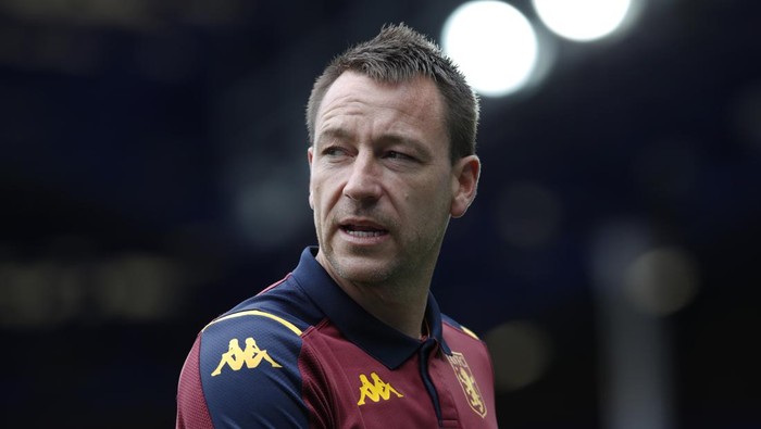 LIVERPOOL, ENGLAND - JULY 16: John Terry, Assistant Manager of Aston Villa looks on prior to the Premier League match between Everton FC and Aston Villa at Goodison Park on July 16, 2020 in Liverpool, England. Football Stadiums around Europe remain empty due to the Coronavirus Pandemic as Government social distancing laws prohibit fans inside venues resulting in all fixtures being played behind closed doors. (Photo by Clive Brunskill/Getty Images)