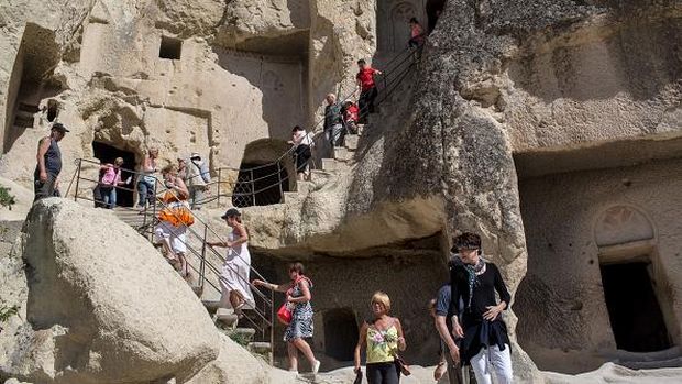NEVSEHIR, TURKEY - APRIL 17:  A young girl runs through a section of an underground city on April 17, 2016 in Nevsehir, Turkey. Cappadocia, a historical region in Central Anatolia dating back to 3000 B.C is one of the most famous tourist sites in Turkey. Listed as a World Heritage Site in 1985, and known for its unique volcanic landscape, fairy chimneys, large network of underground dwellings and some of the best hot air ballooning in the world, Cappadocia is preparing for peak tourist season to begin in the first week of May.  Despite Turkey's tourism downturn, due to the recent terrorist attacks,  internal instability and tension with Russia, local vendors expect tourist numbers to be stable mainly due to the unique activities on offer and unlike other tourist areas in Turkey such as Antalya, which is popular with Russian tourists, Cappadocia caters to the huge Asian tourist market.  (Photo by Chris McGrath/Getty Images)