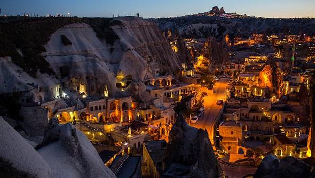 NEVSEHIR, TURKEY - APRIL 17:  A young girl runs through a section of an underground city on April 17, 2016 in Nevsehir, Turkey. Cappadocia, a historical region in Central Anatolia dating back to 3000 B.C is one of the most famous tourist sites in Turkey. Listed as a World Heritage Site in 1985, and known for its unique volcanic landscape, fairy chimneys, large network of underground dwellings and some of the best hot air ballooning in the world, Cappadocia is preparing for peak tourist season to begin in the first week of May.  Despite Turkey's tourism downturn, due to the recent terrorist attacks,  internal instability and tension with Russia, local vendors expect tourist numbers to be stable mainly due to the unique activities on offer and unlike other tourist areas in Turkey such as Antalya, which is popular with Russian tourists, Cappadocia caters to the huge Asian tourist market.  (Photo by Chris McGrath/Getty Images)