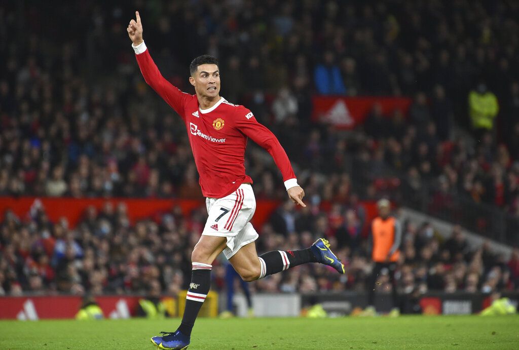 Manchester United's Cristiano Ronaldo in action during the English Premier League soccer match between Manchester United and Burnley at Old Trafford in Manchester, England, Thursday, Dec. 30, 2021. (AP Photo/Rui Vieira)
