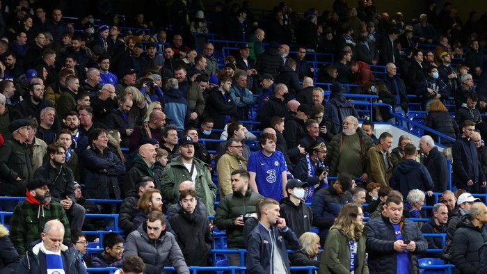 LONDON, ENGLAND - JANUARY 02: Chelsea fans use the Safe standing area during the Premier League match between Chelsea  and  Liverpool at Stamford Bridge on January 02, 2022 in London, England. (Photo by Catherine Ivill/Getty Images)