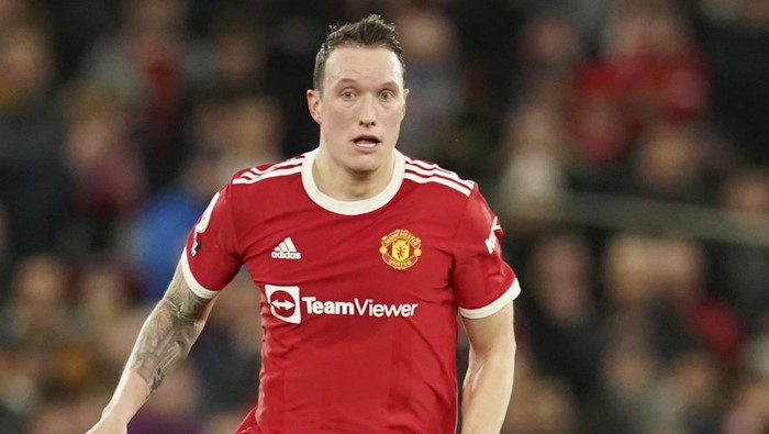 Manchester Uniteds Phil Jones controls the ball during the English Premier League soccer match between Manchester United and Wolverhampton Wanderers at Old Trafford stadium in Manchester, England, Monday, Jan.3, 2022. (AP Photo/Dave Thompson)
