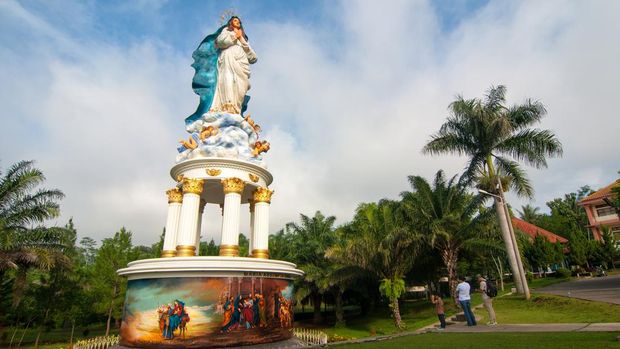 Big statue of Maria Assumpta in Maria cave Ambarawa, Central Java, Indonesia.