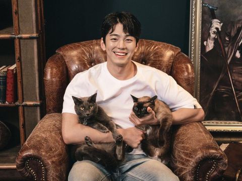 Kim Min Kyu merupakan sosok penyayang kucing
