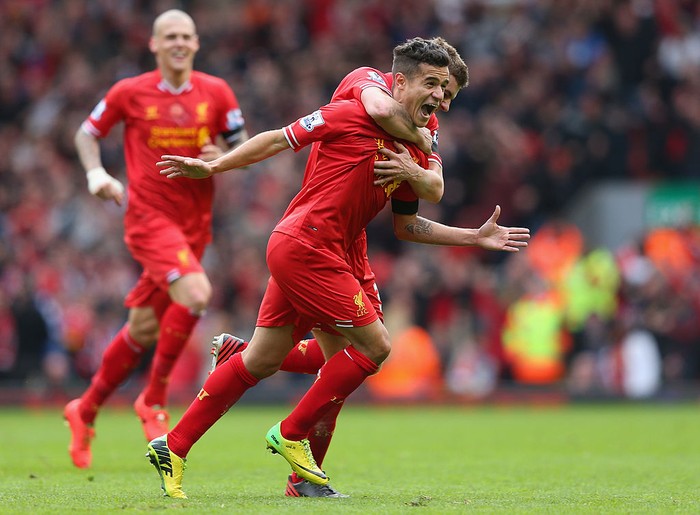 LIVERPOOL, ENGLAND - APRIL 13:  Philippe Coutinho of Liverpool celebrates scoring his teams third goal during the Barclays Premier League match between Liverpool and Manchester City at Anfield on April 13, 2014 in Liverpool, England.  (Photo by Alex Livesey/Getty Images)