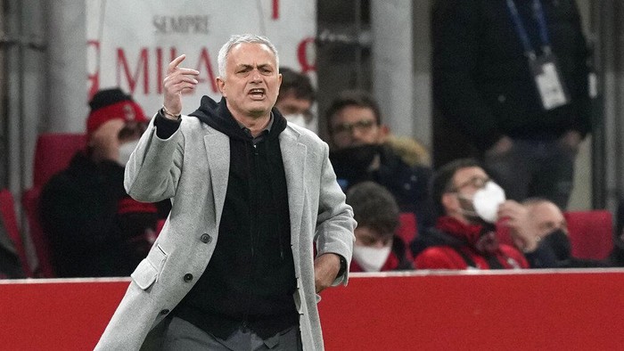 Romas head coach Jose Mourinho reacts during the Serie A soccer match between AC Milan and Roma at the San Siro stadium, in Milan, Italy, Thursday, Jan. 6, 2022. (AP Photo/Antonio Calanni)