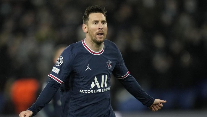 PSGs Lionel Messi celebrates after scoring his sides fourth goal during the Champions League Group A soccer match between PSG and Club Brugge at the Parc des Princes stadium in Paris, France, Tuesday, Dec. 7, 2021. (AP Photo/Christophe Ena)