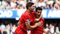 Kolaborasi Gerrard dan Coutinho, pada masanya, menjadi andalan Liverpool. Foto: Getty Images/Paul Gilham