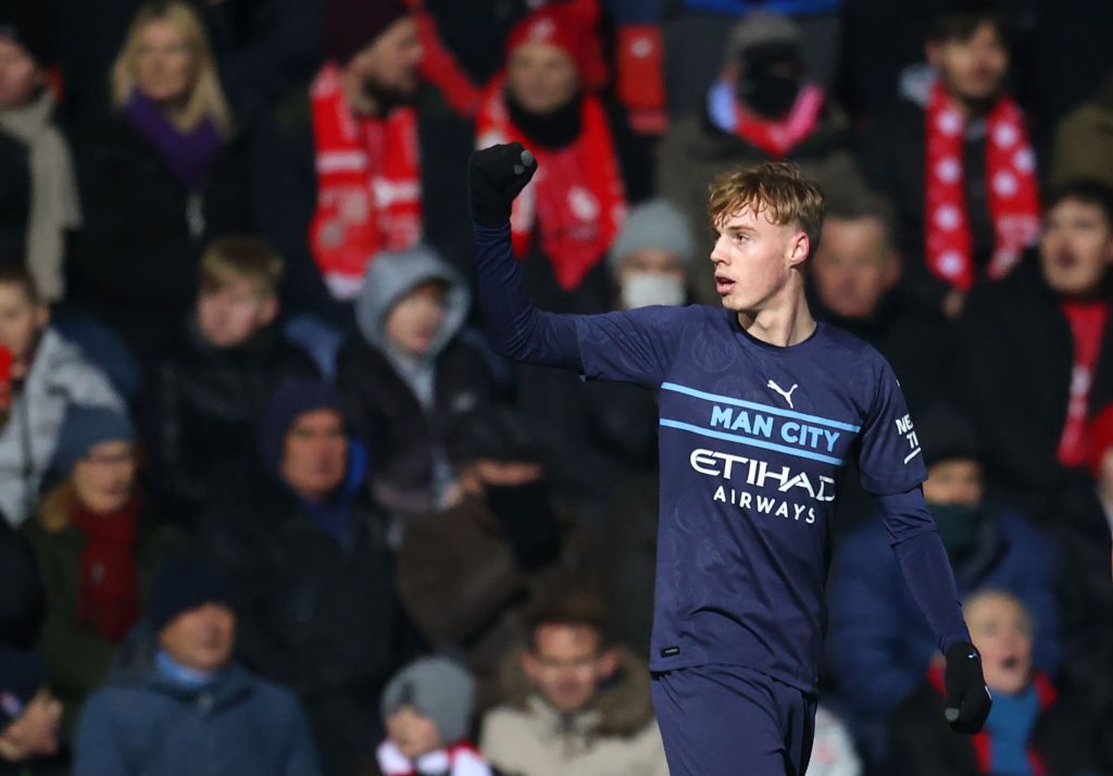 SWINDON, ENGLAND - JANUARY 07: Cole Palmer of Manchester City celebrates after he scores his sides fourth goal during the Emirates FA Cup Third Round match between Swindon Town and Manchester City at County Ground on January 07, 2022 in Swindon, England. (Photo by Catherine Ivill/Getty Images)