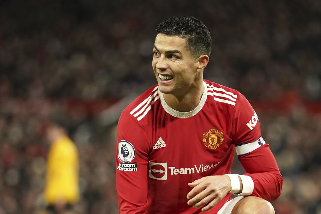 Manchester United's Cristiano Ronaldo grimaces during the English Premier League soccer match between Manchester United and Wolverhampton Wanderers at Old Trafford stadium in Manchester, England, Monday, Jan.3, 2022. (AP Photo/Dave Thompson)