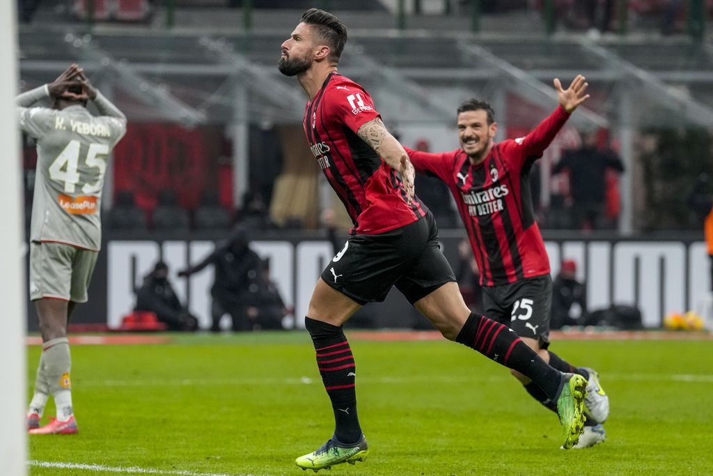 AC Milan's Olivier Giroud reacts after scoring his side's first goal during an Italian Cup soccer match between AC Milan and Genoa at the San Siro stadium in Milan, Italy, Thursday, Jan. 13, 2022. (AP Photo/Antonio Calanni)