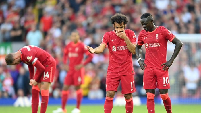 LIVERPOOL, ENGLAND - AUGUST 28: Mohamed Salah and Sadio Mane of Liverpool interact  during the Premier League match between Liverpool  and  Chelsea at Anfield on August 28, 2021 in Liverpool, England. (Photo by Michael Regan/Getty Images)