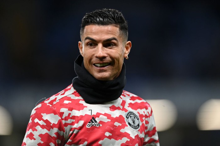 LONDON, ENGLAND - NOVEMBER 28: Cristiano Ronaldo of Manchester United looks on as he warms up prior to the Premier League match between Chelsea and Manchester United at Stamford Bridge on November 28, 2021 in London, England. (Photo by Shaun Botterill/Getty Images )