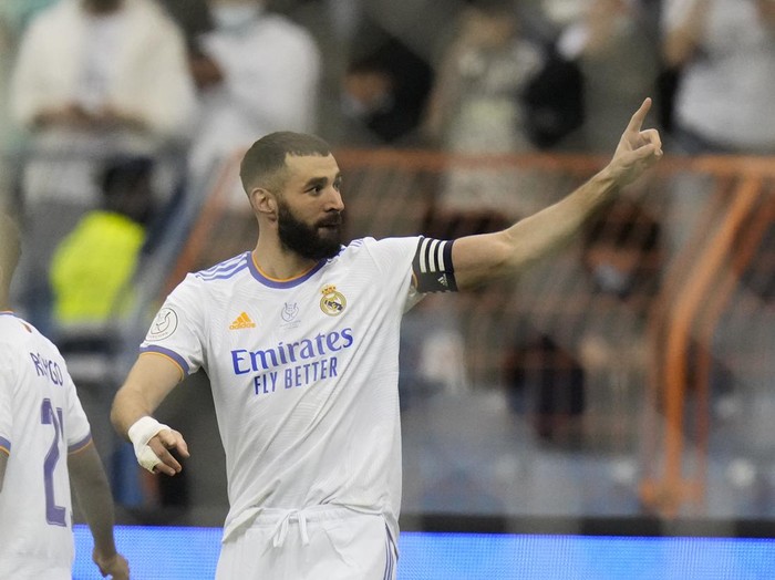 Real Madrid's Karim Benzema reacts after scoring from a penalty kick during the Spanish Super Cup final soccer match between Real Madrid and Athletic Bilbao at King Fahd stadium in Riyadh, Saudi Arabia, Sunday, Jan. 16, 2022. (AP Photo/Hassan Ammar)