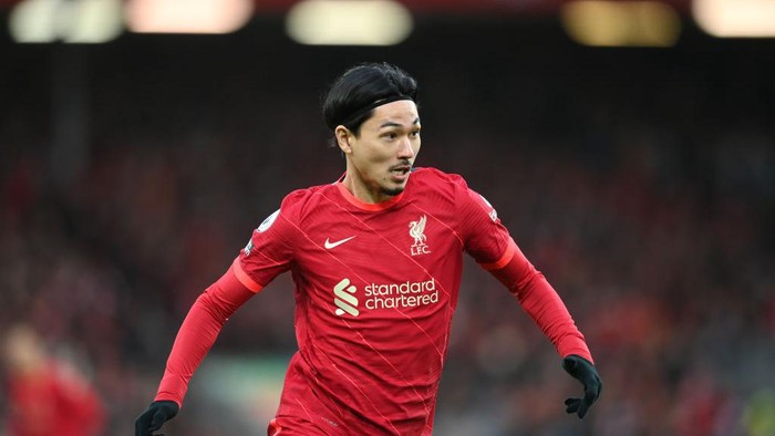 Takumi Minamino LIVERPOOL, ENGLAND - JANUARY 16: Takumi Minamino of Liverpool looks on during the Premier League match between Liverpool and Brentford at Anfield on January 16, 2022 in Liverpool, England. (Photo by Michael Regan/Getty Images)