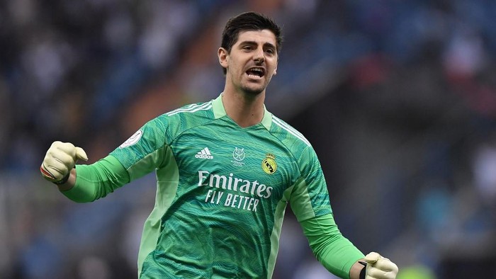 Real Madrid's Belgian goalkeeper Thibaut Courtois celebrates his team's opening goal during the Spanish Super Cup final football match between Athletic Bilbao and Real Madrid on January 16, 2022, at the King Fahd International stadium in the Saudi capital of Riyadh. (Photo by AFP)
