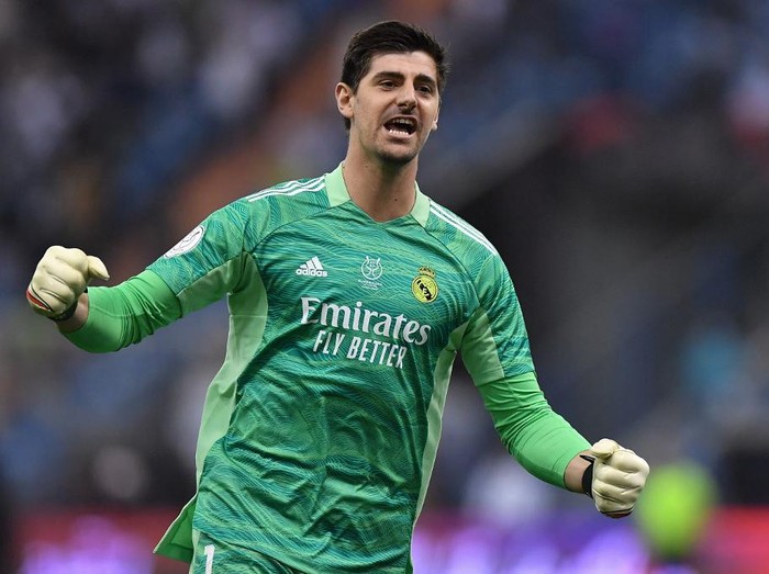 Real Madrid's Belgian goalkeeper Thibaut Courtois celebrates his team's opening goal during the Spanish Super Cup final football match between Athletic Bilbao and Real Madrid on January 16, 2022, at the King Fahd International stadium in the Saudi capital of Riyadh. (Photo by AFP)