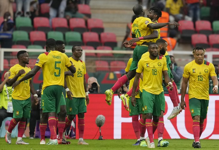 Cameroons captain Vincent Aboubakar, top left, celebrates with teammate after scoring his teams first goal, during the African Cup of Nations 2022 group A soccer match between Cape Verde and Cameron at the Olembe stadium in Yaounde, Cameroon, Monday, Jan. 17, 2022. (AP Photo/Themba Hadebe)