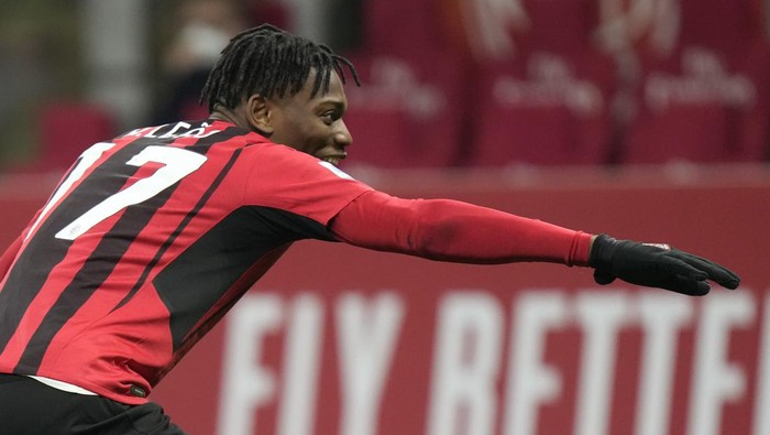 AC Milans Rafael Leao celebrates after scores against Spezia during a Serie A soccer match between AC Milan and Spezia, at the San Siro stadium in Milan, Italy, Monday, Jan.17, 2022. (AP Photo/Luca Bruno)