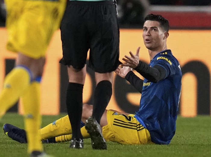 Manchester United's Cristiano Ronaldo claims for a foul during an English Premier League soccer match between Brentford and Manchester United at the Brentford Community Stadium in London, Wednesday, Jan. 19, 2022. (AP Photo/Matt Dunham)