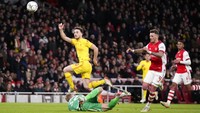 Jota berhasil merobek gawang Arsenal untuk kedua kalinya di menit ke-77. Dia lepas dari posisi offside untuk kemudian mengangkat bola melewati kepala Ramsdale. AP Photo/Matt Dunham.
