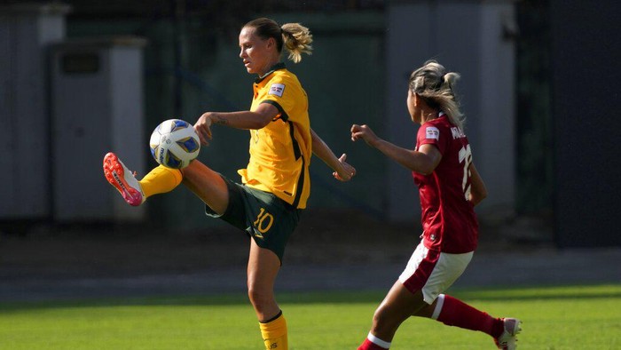 Australia's Mary Fowler kicks the ball during the AFC Women's Asian Cup 2022 match between Australia and Indonesia in Mumbai, India, Friday, Jan. 21, 2022. (AP Photo/Rajanish Kakade)