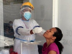 Omicron Menyebar Cepat, Berapa Lama Pengidapnya Bisa Menulari Orang Lain?