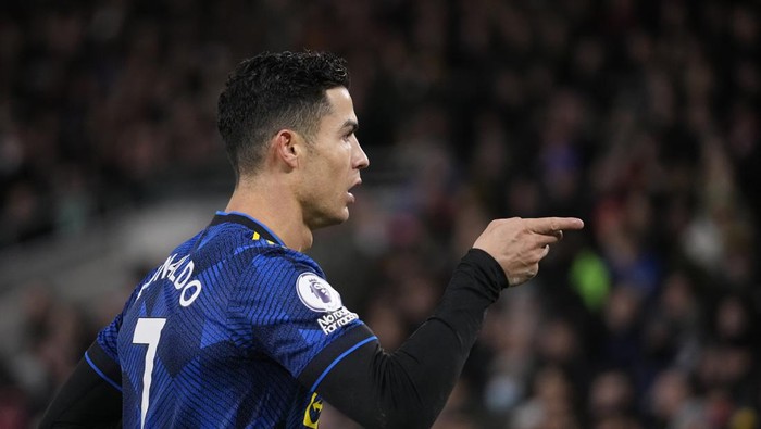 Manchester Uniteds Cristiano Ronaldo points during an English Premier League soccer match between Brentford and Manchester United at the Brentford Community Stadium in London, Wednesday, Jan. 19, 2022. (AP Photo/Matt Dunham)