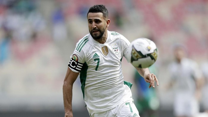 Algerias Riyad Mahrez in action during the African Cup of Nations 2022 group E soccer match between Algeria and Sierra Leone at the Japoma Stadium in Doula, Cameroon, Tuesday Jan. 11, 2022. (AP Photo/Sunday Alamba)
