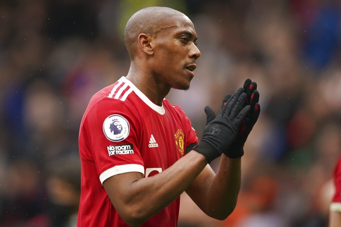 FILE - Manchester Uniteds Anthony Martial applauds fan as he walks off the pitch at half-time, during the English Premier League soccer match between Manchester United and Everton, at Old Trafford, Manchester, England, Saturday, Oct. 2, 2021. Martial has told Manchester United he wants to leave. The France forward has dropped down the pecking order at Old Trafford. He has made just two Premier League starts this season and only four in all competitions. (Dave Thompson, Pool via AP, File)
